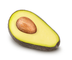 Half of ripe avocado with seed isolated on a white