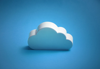 White cloud shape over blue background 