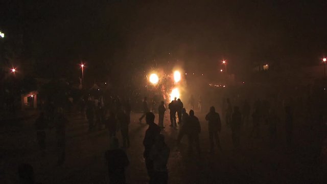 Torito shoots out fireworks into the crowd shot on the point of view of a by standard 8
