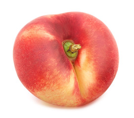 Flat nectarine isolated on white. Full depth of field.