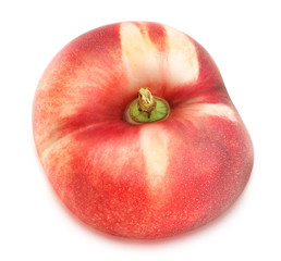 Flat nectarine isolated on white. Full depth of field.