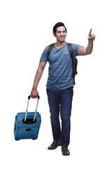 Happy asian traveler with backpack and suitcase pointing something