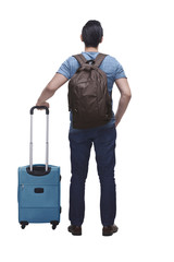 Back view of asian tourist with suitcase