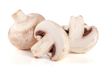 Fresh champignon mushrooms isolated on white background