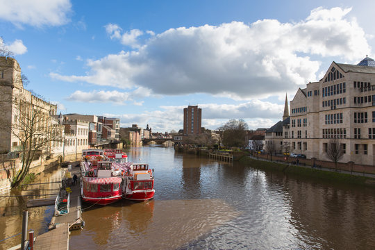 York uk view from Lendal bridge of River Ouse and pleasure boats in the historic Yorkshire city 