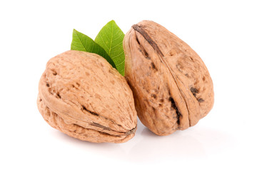 Walnuts with leaf isolated on white background