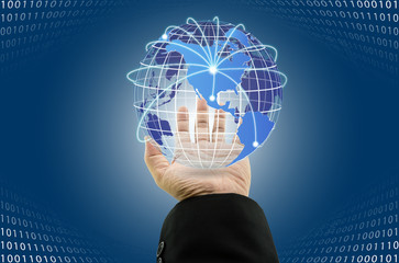 Businessman with digital world map with global connections over his hand and abstract binary code technology background, Concept of connecting people