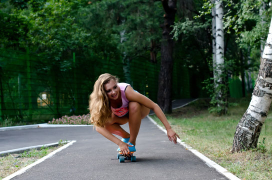 beautiful girl with skateboard