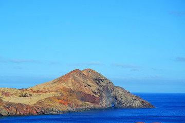 View of beautiful mountains and ocean on northern Madeira island, Portugal.