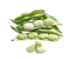 broad beans   pods and grains on an isolated white background