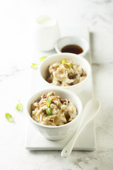Oatmeal pudding with raisins and cinnamon