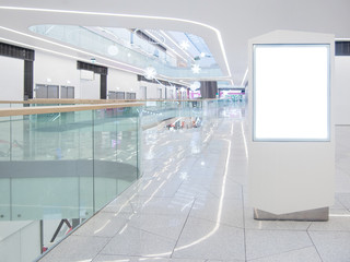 Mocap banner in the interior of the shopping center, blurred shopping mall background. Commercial...