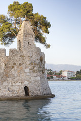 Fototapeta na wymiar fortifications of the old harbour along the sea wall, Nafpaktos, Greece, Europe