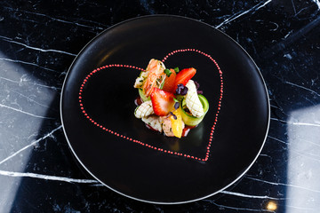 Cooked prawns appetizer with fruits