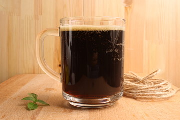 Kvass on a wooden background