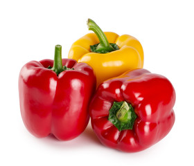 Red and yellow sweet peppers isolated on white background