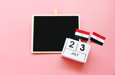 July 23 Wooden calendar and blackboard Concept independence day of Egypt and Egypt national day.Copy space,minimal style