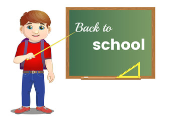 Young student is standing near the training board. Pupil of a school, college and university at the blackboard.