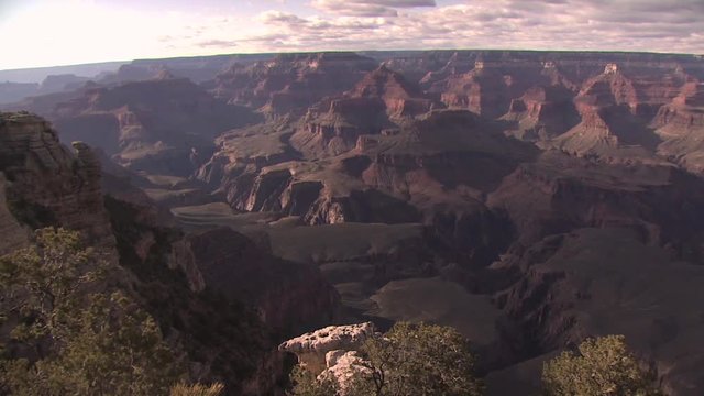 Panoramic View of the Grand Canyon with A Cloudy Sky in The Background
