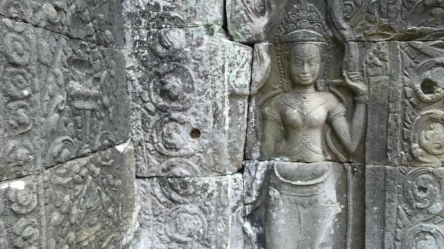 Apsara Divine Dancer Carved On Stone Wall in Angkor Wat Cambodia. HD, 1920x1080. Siem Reap, Cambodia. 