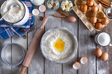 Floor and yolk top view on rustic wood background