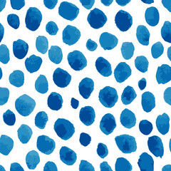 Blue randomly dotted background. Seamless vector pattern 