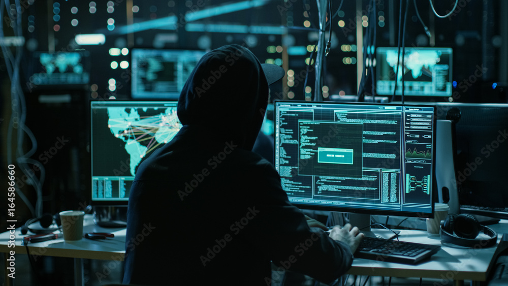 Aufkleber Teenage Hacker Working with His Computer Infecting Servers and Infrastructure with Malware. His Hideout is Dark and Has Multiple displays.