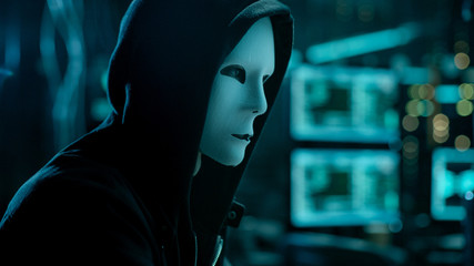 Masked Hacktivist Organizes malware Virus Attack on Global Scale. Hacker in Underground Secret...