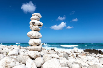 Fototapeta na wymiar Stone tower by the beach