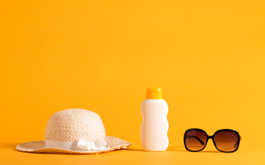 Summer sun protection objects theme on a yellow background