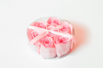 soap rose in gift box with bow on white background