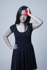 Young Asian woman got sick and  headache.