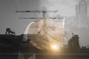 Double exposure worker hand shake teamwork brainstorming with innovation business. concept success investment.