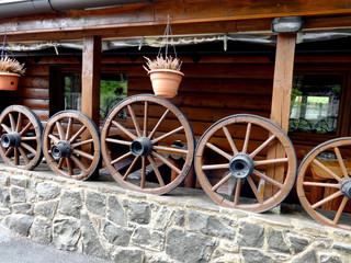 Fototapeta na wymiar Old wooden wheels