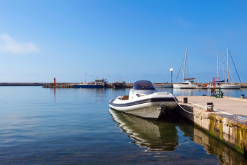 Pleasure boats, sailing boats are moored in marina of Balchik city in black sea coast at Bulgaria