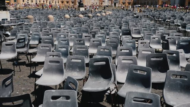 A lot of empty chairs for parishioners and pilgrims near St. Peter's Basilica, Vatican City