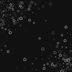 Soap bubbles. Abstract chaotic scatter with soap bubbles on black background. Vector illustration.