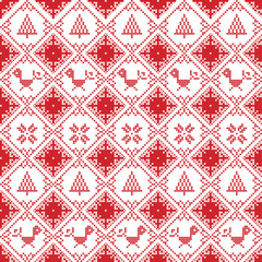 Scandinavian seamless cross stitch inspired Nordic style Christmas pattern in cross stitch with robin, snowflake, star, decorative ornaments in red and white 
