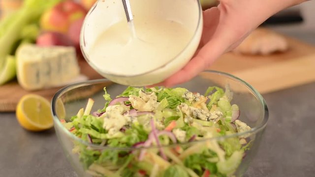 Waldort salad prepare and serving, stock footage