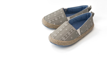 Toddler shoes. Stylish pair of espadrilles over isolated on white background