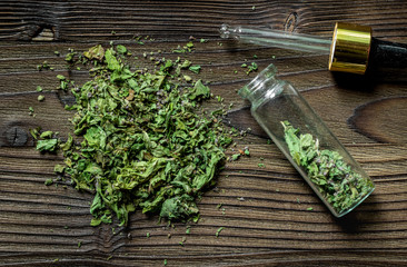 Alternative medicine. Store up medicinal herbs. Dried herbs on wooden table background