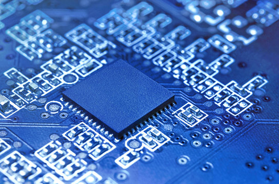 Electronic circuit board with processor. Technology background.
