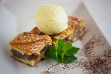 Apple pie with vanilla ice cream.