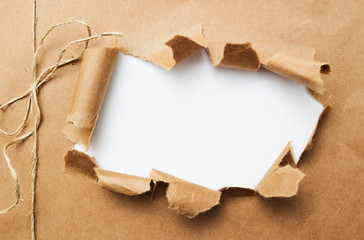 Package ripped on white background