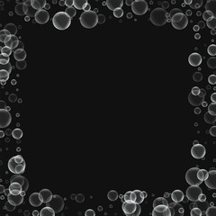 Random soap bubbles. Square scattered border with random soap bubbles on black background. Vector illustration.