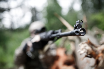 Photo of soldier with arms
