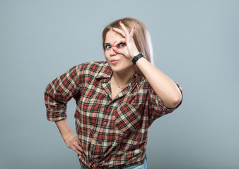 Young girl with fun gesture