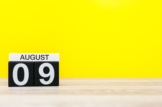 August 9th. Image of august 9, calendar on yellow background with empty space for text. Summer time