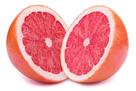 Perfectly retouched sliced halves of grapefruits isolated on the white background with clipping path