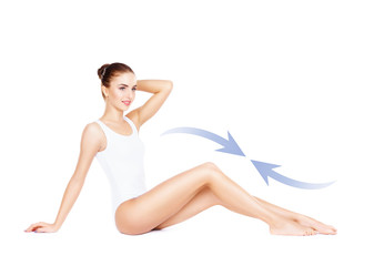 Fit and sporty young girl with arrows isolated on white background. Health, sport, fitness, nutrition, at lose, epilation, cellulite removal, liposuction, healthy life-style concept.